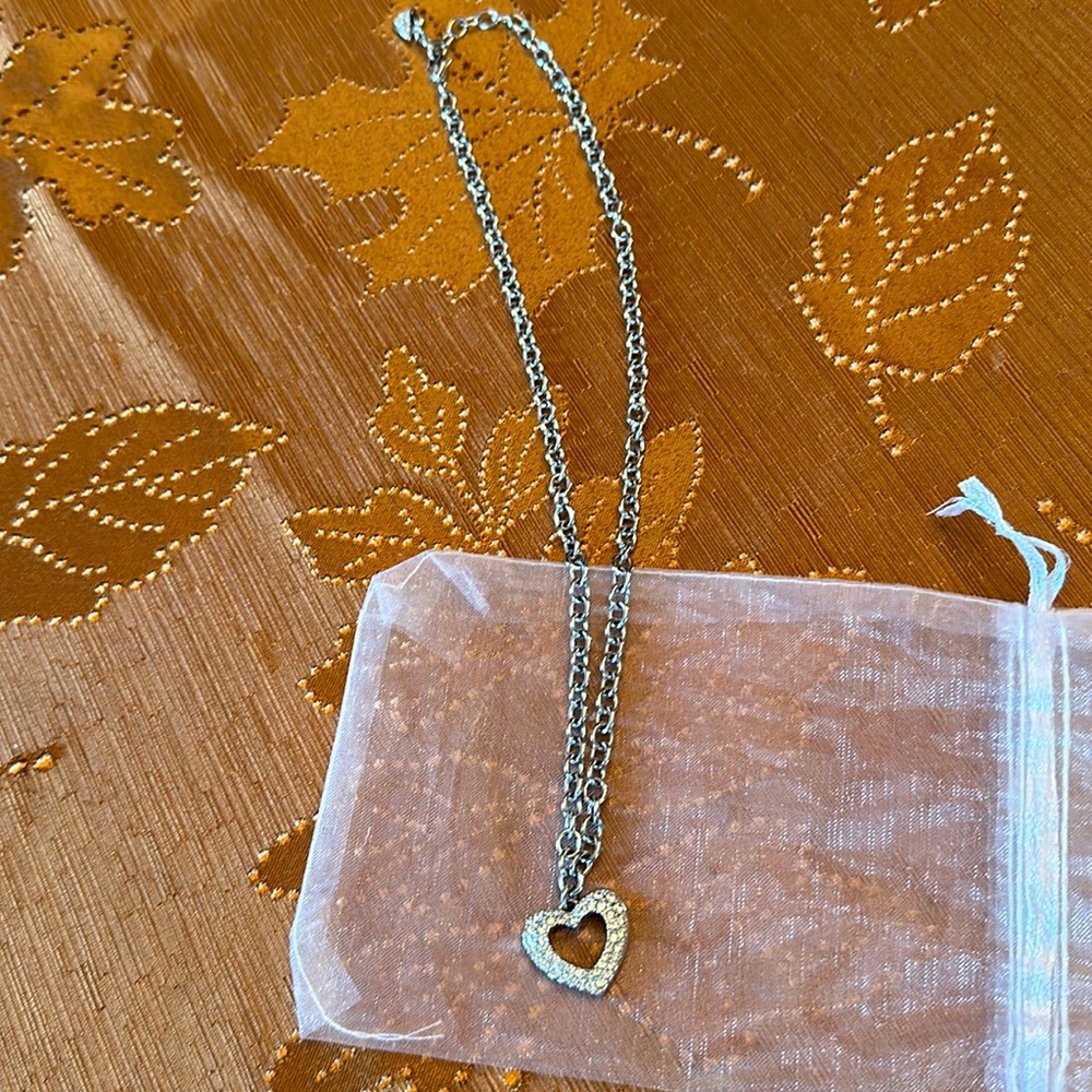 Swarovski crystal heart necklace on thick chain 18l length, good condition.